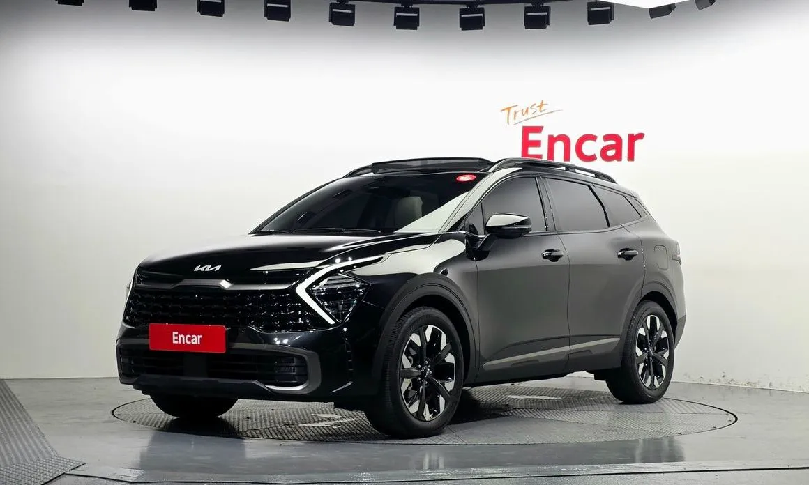 Kia Sportage — фото 1