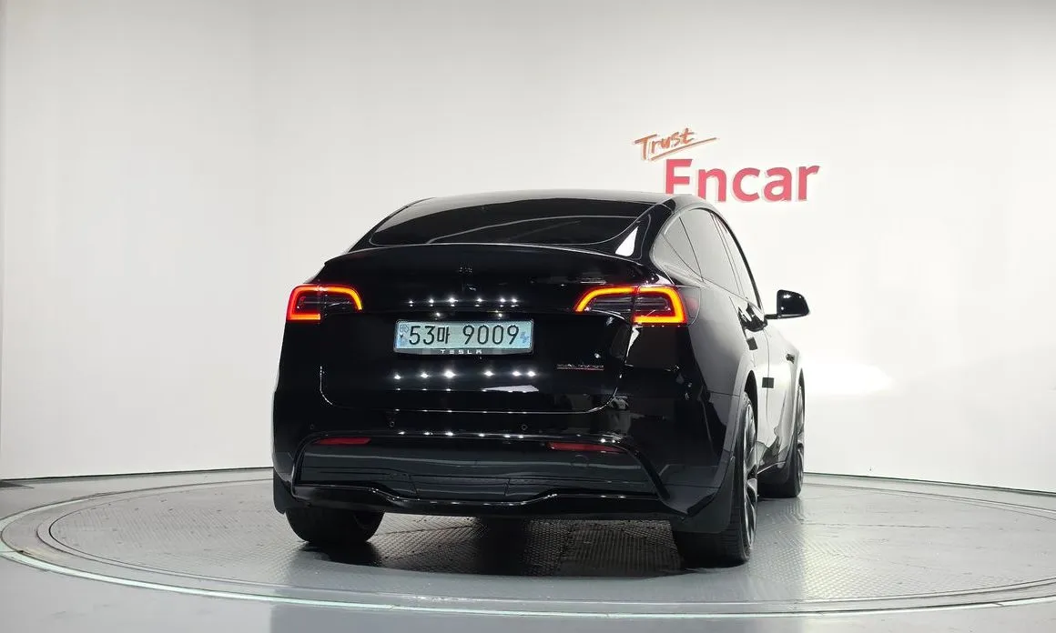 Tesla Model Y — фото 7