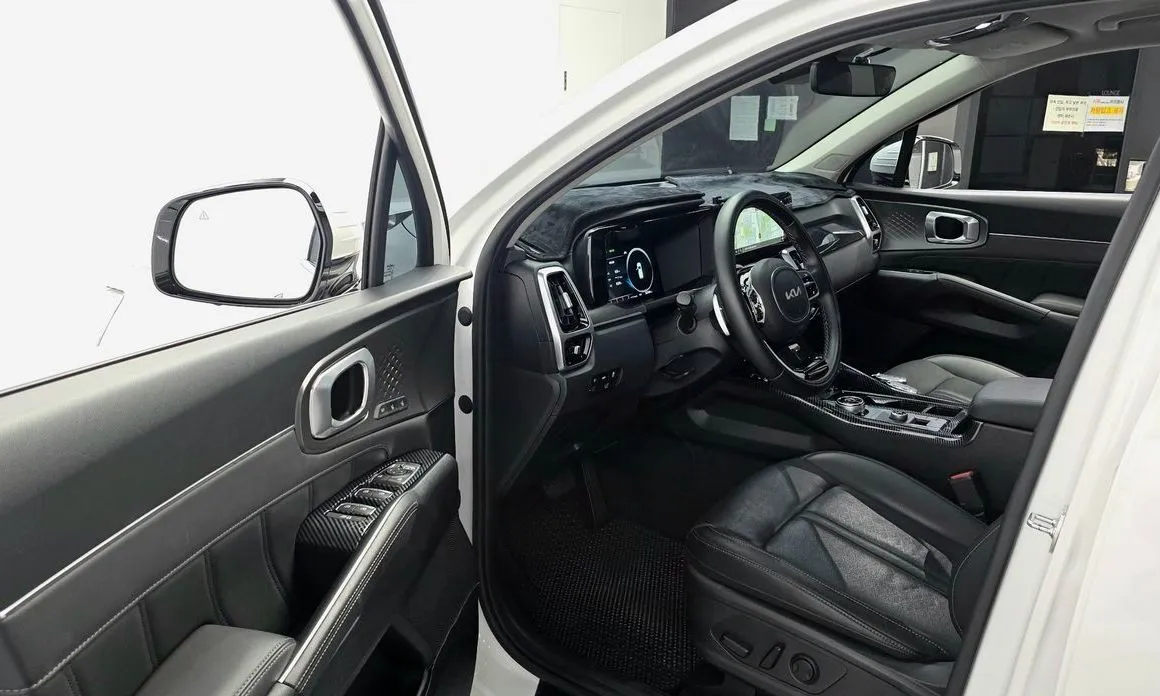 Kia Sorento — фото 7