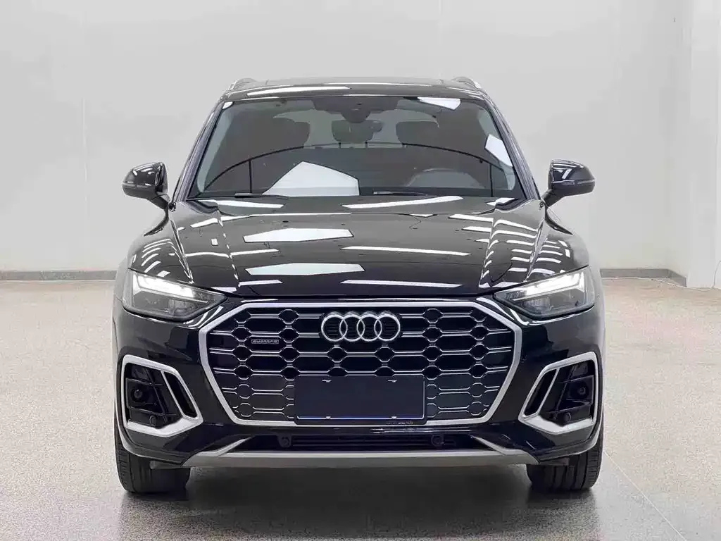 Audi Q5L — фото 5
