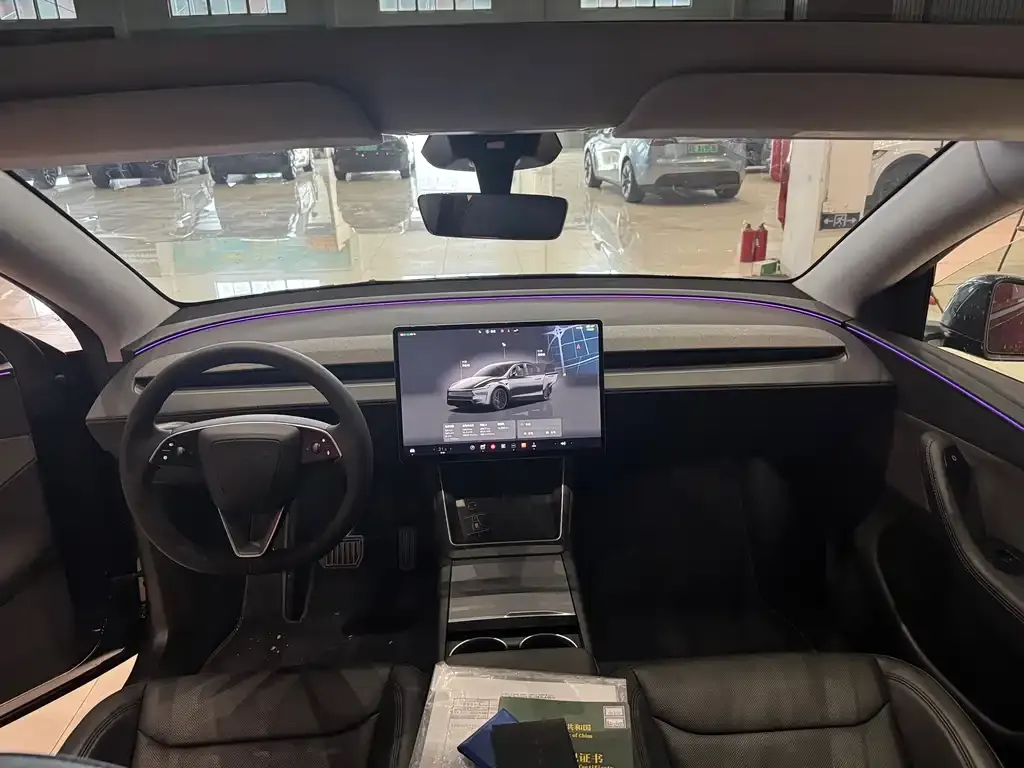 Tesla Model Y — фото 6