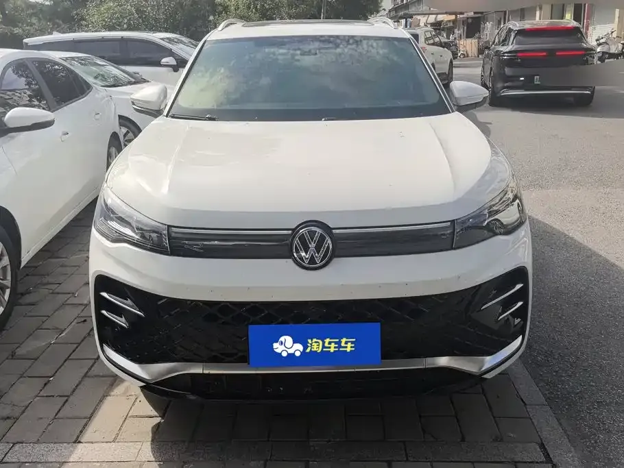 Volkswagen Tiguan L — фото 7