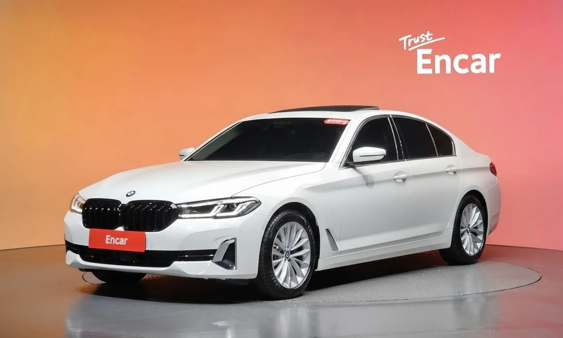 BMW 5-Series — фото 1