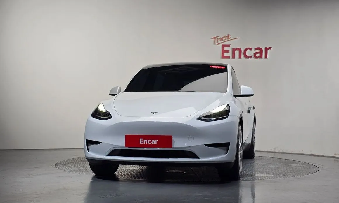 Tesla Model Y — фото 9