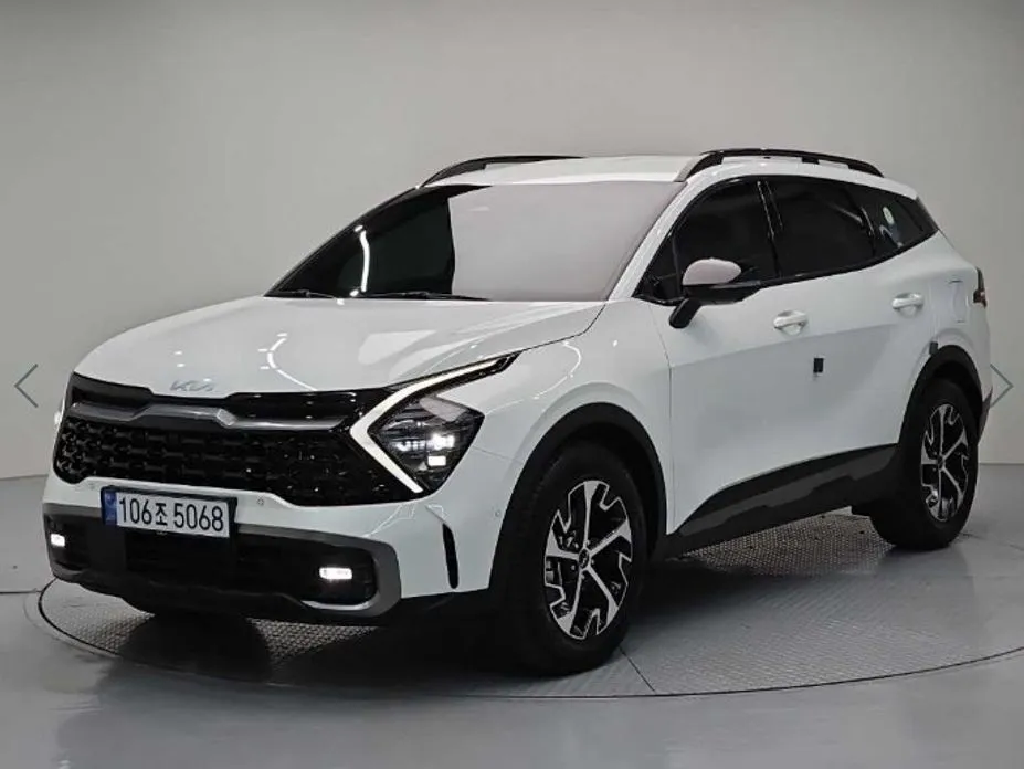 Kia Sportage — фото 1