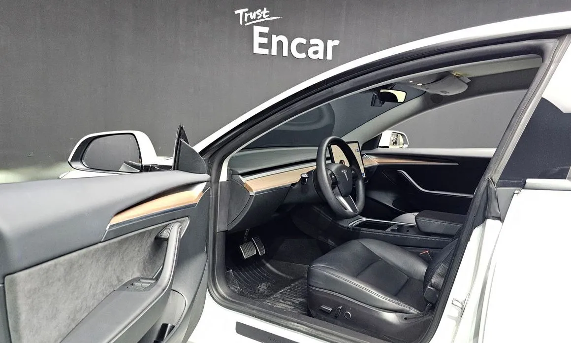 Tesla Model 3 — фото 9