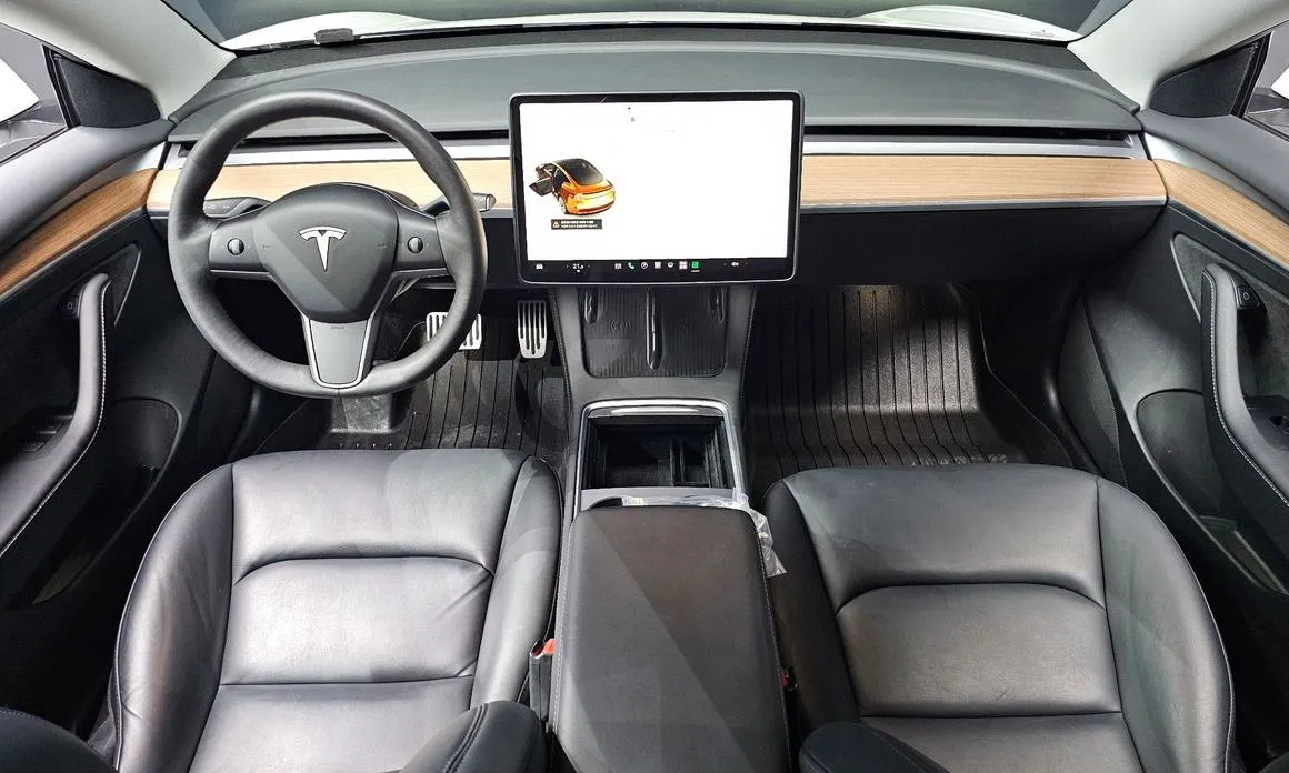 Tesla Model 3 — фото 10
