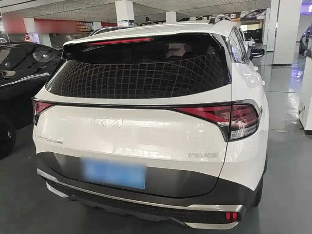 Kia Sportage — фото 10