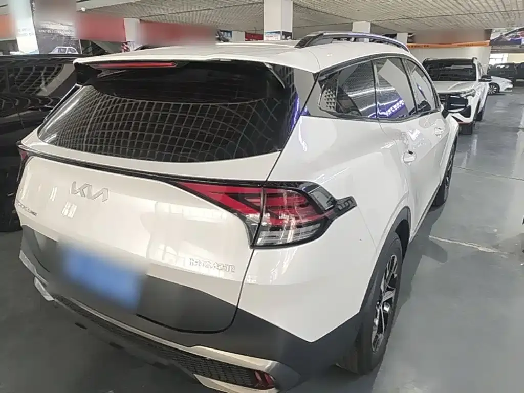 Kia Sportage — фото 8