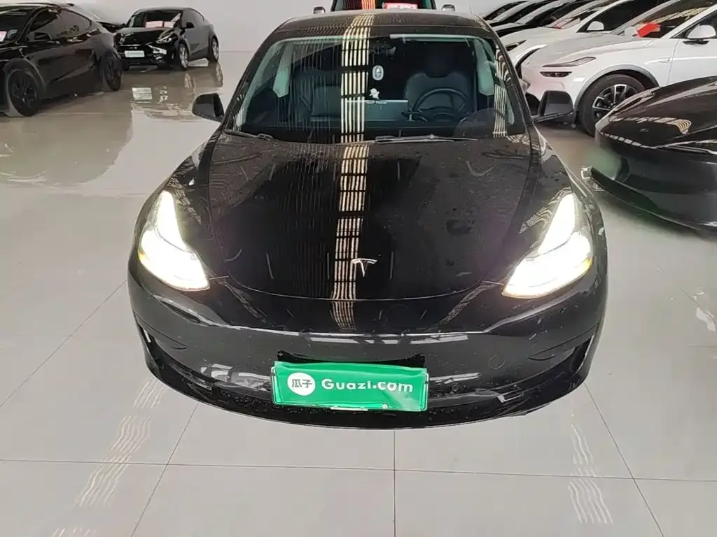 Tesla Model 3 — фото 10