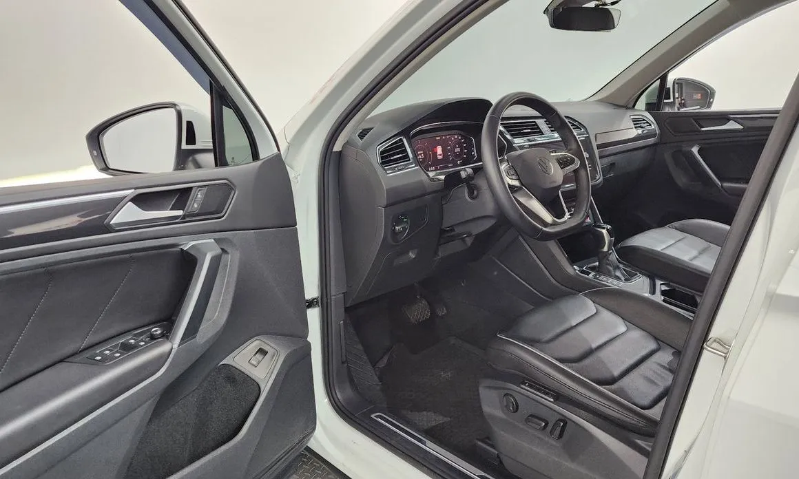 Volkswagen Tiguan — фото 9