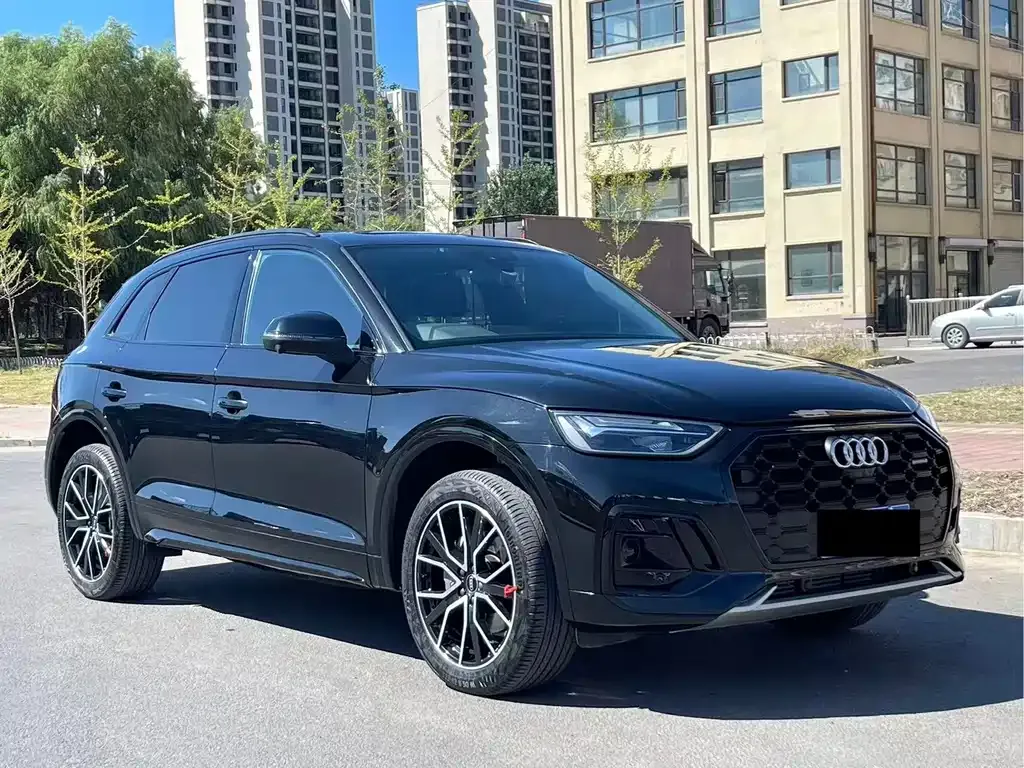 Audi Q5L — фото 9