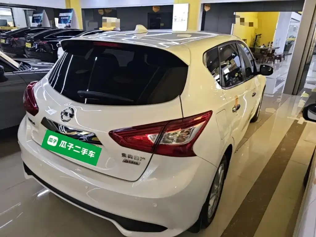 Nissan Tiida — фото 10