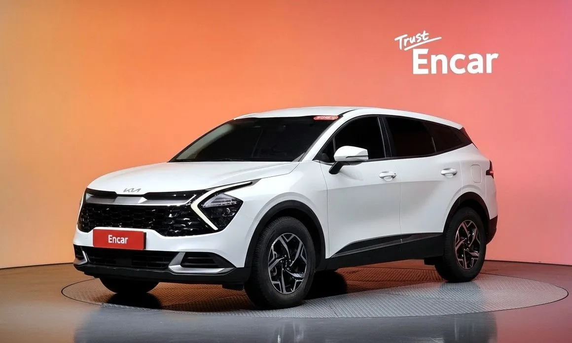 Kia Sportage — фото 1