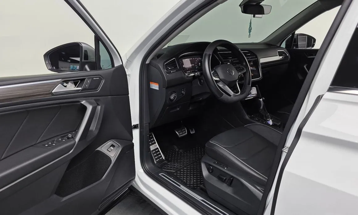 Volkswagen Tiguan — фото 8