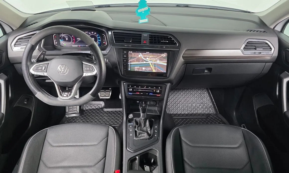 Volkswagen Tiguan — фото 9