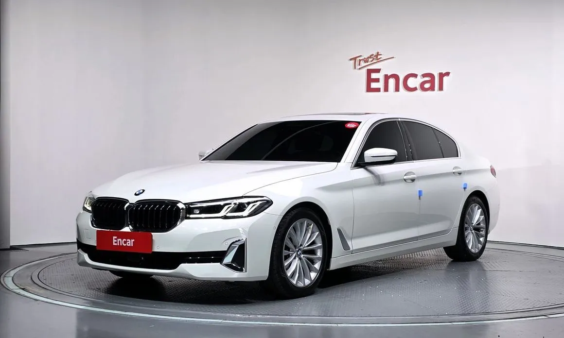 BMW 5-Series — фото 1