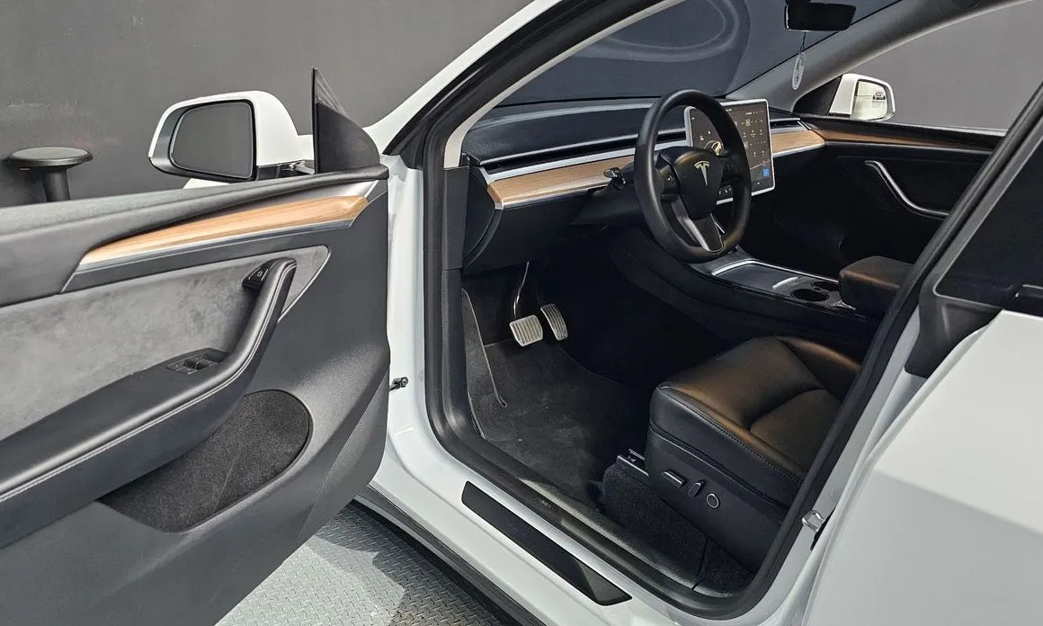 Tesla Model Y — фото 7