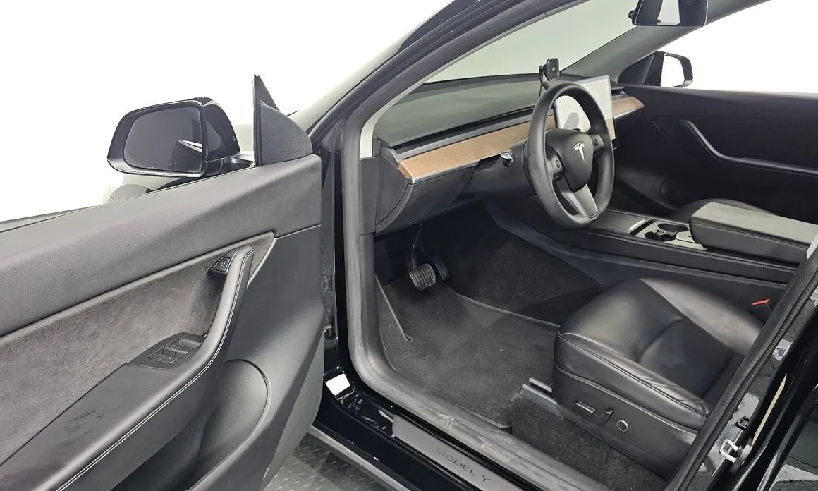 Tesla Model Y — фото 7