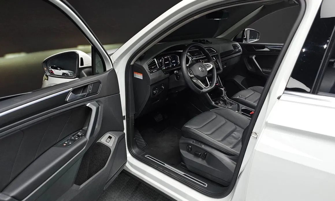 Volkswagen Tiguan — фото 7