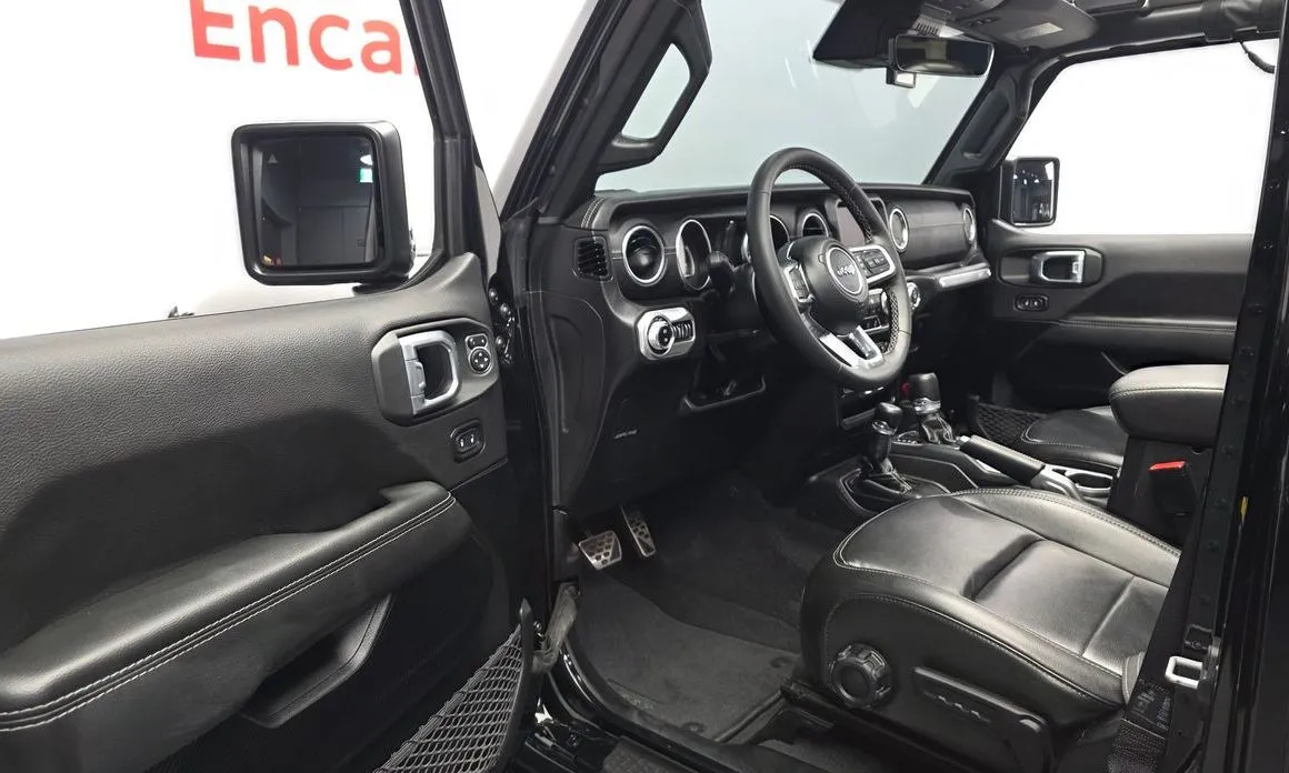 Jeep Wrangler — фото 10