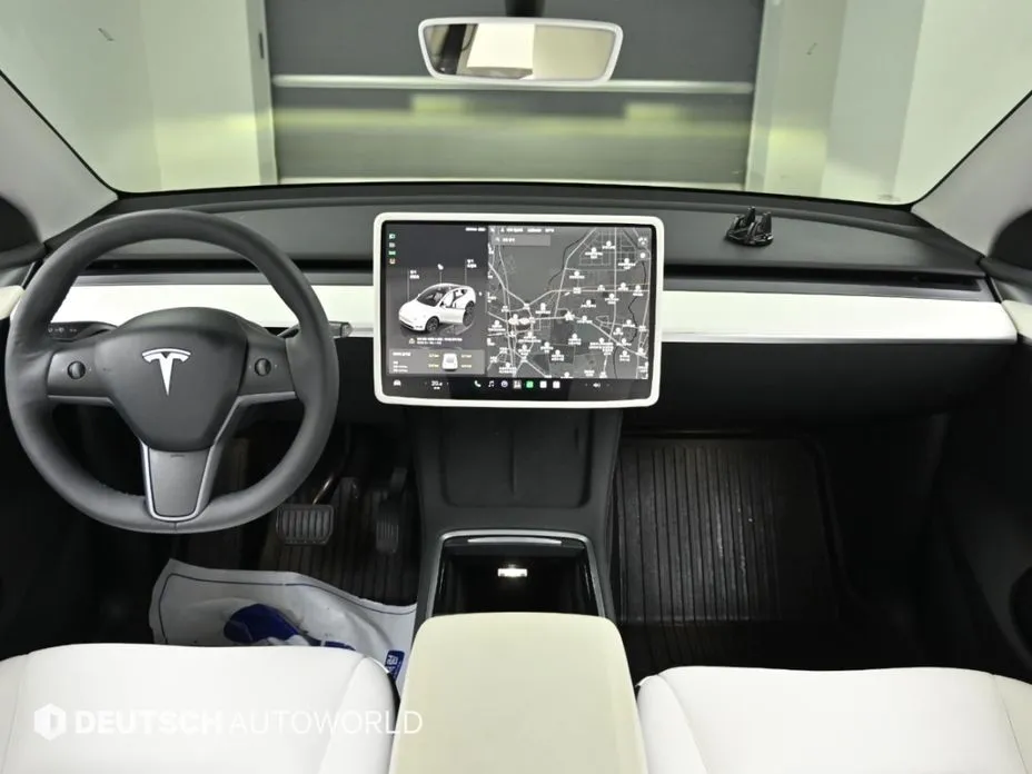 Tesla Model Y — фото 9