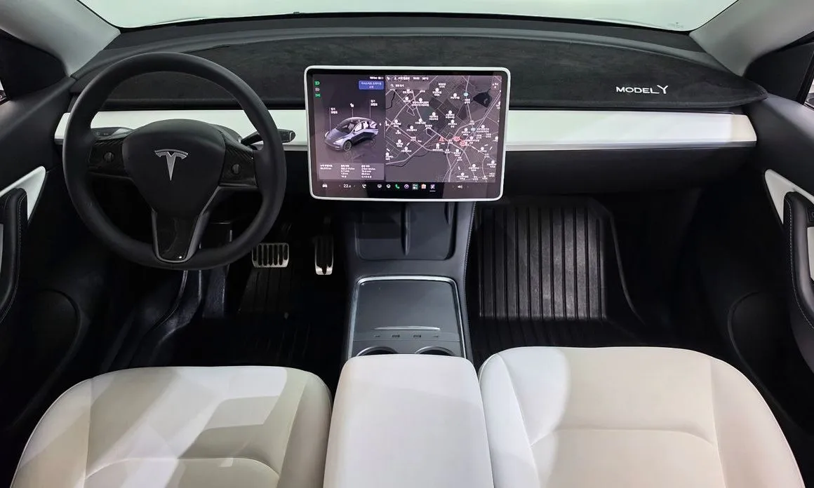 Tesla Model Y — фото 8