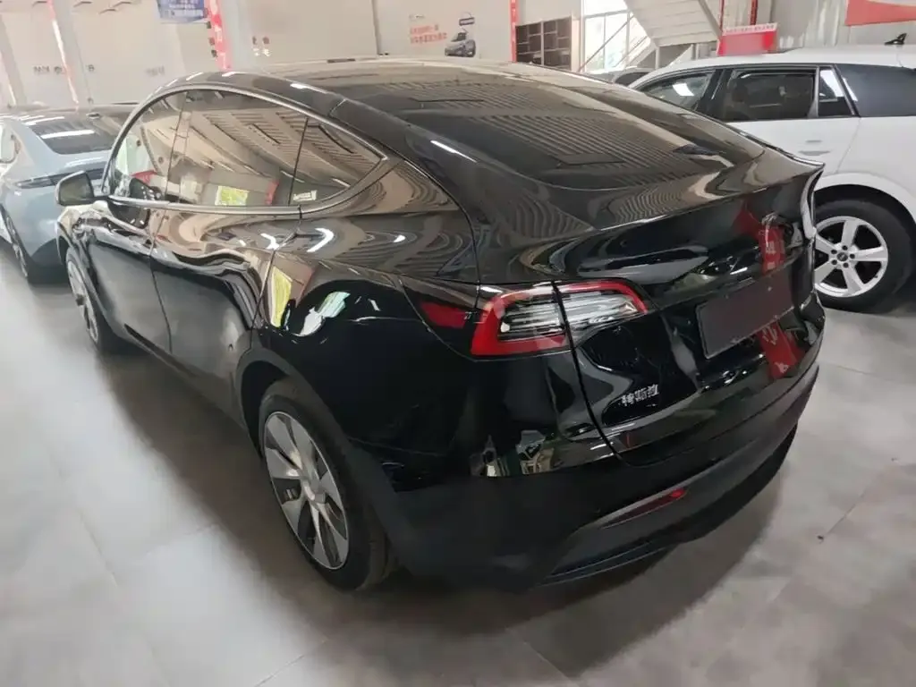 Tesla Model Y — фото 7