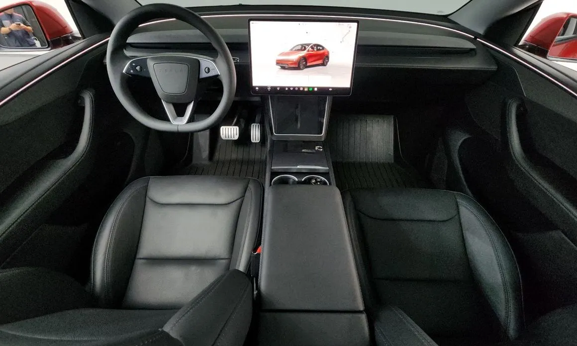 Tesla Model Y — фото 8