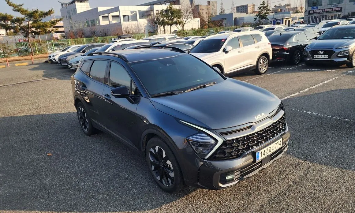 Kia Sportage — фото 1