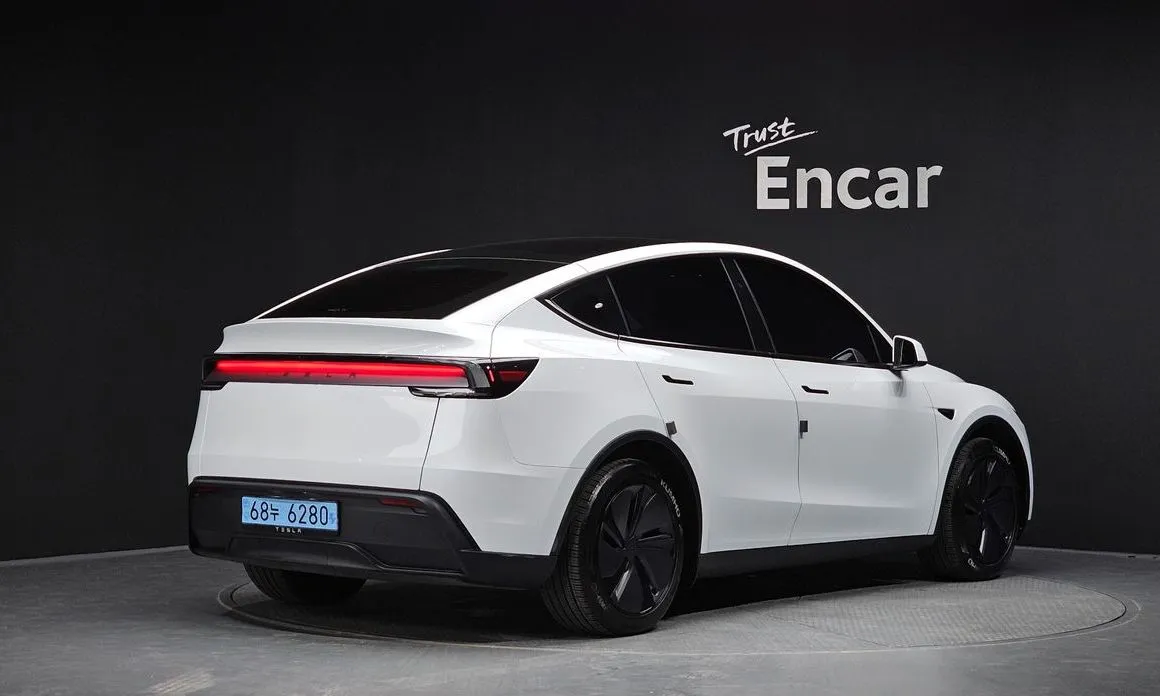 Tesla Model Y — фото 4
