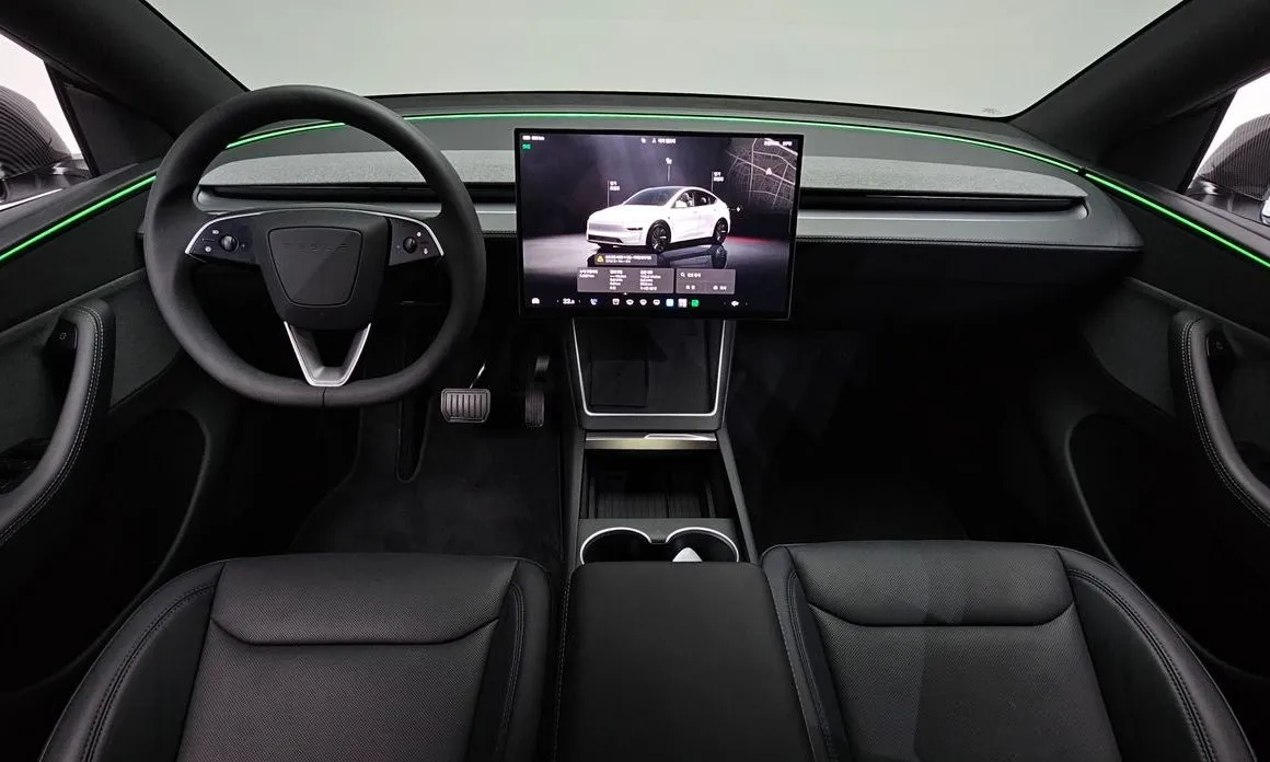 Tesla Model Y — фото 7