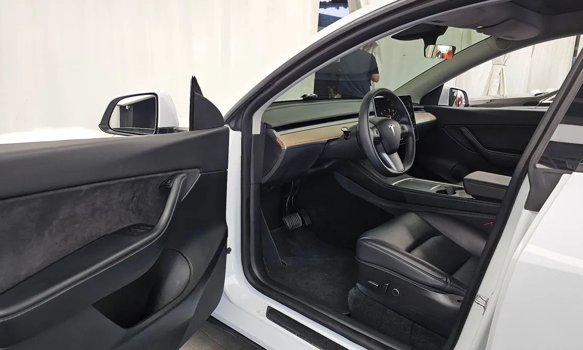 Tesla Model Y — фото 6