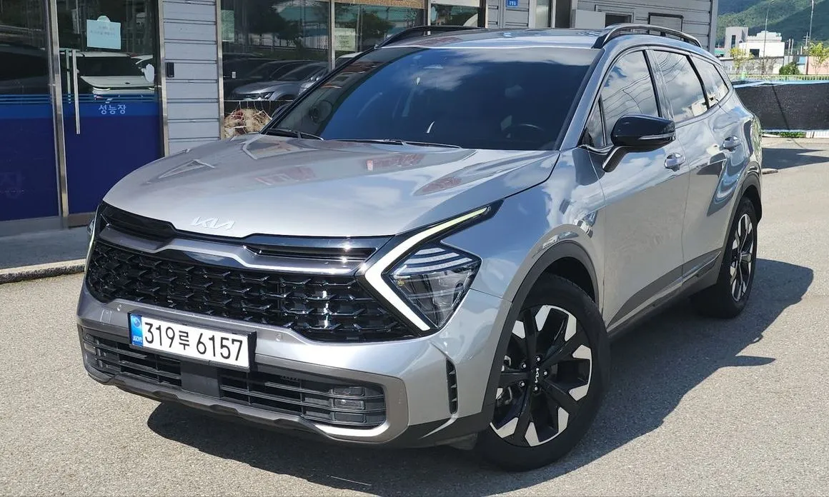 Kia Sportage — фото 1