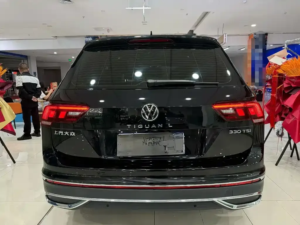 Volkswagen Tiguan L — фото 7