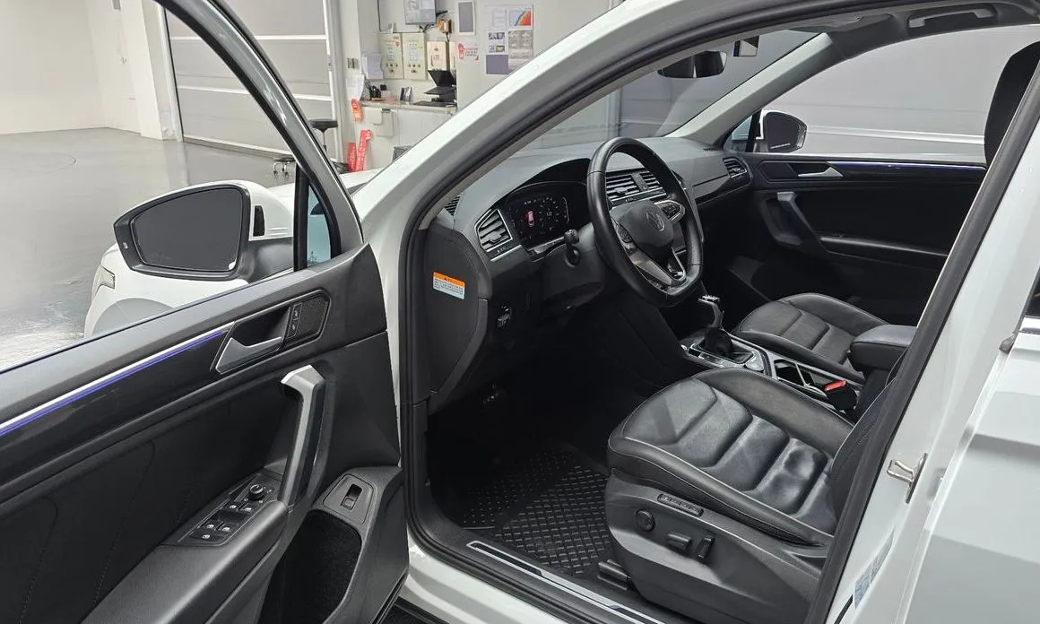 Volkswagen Tiguan — фото 7