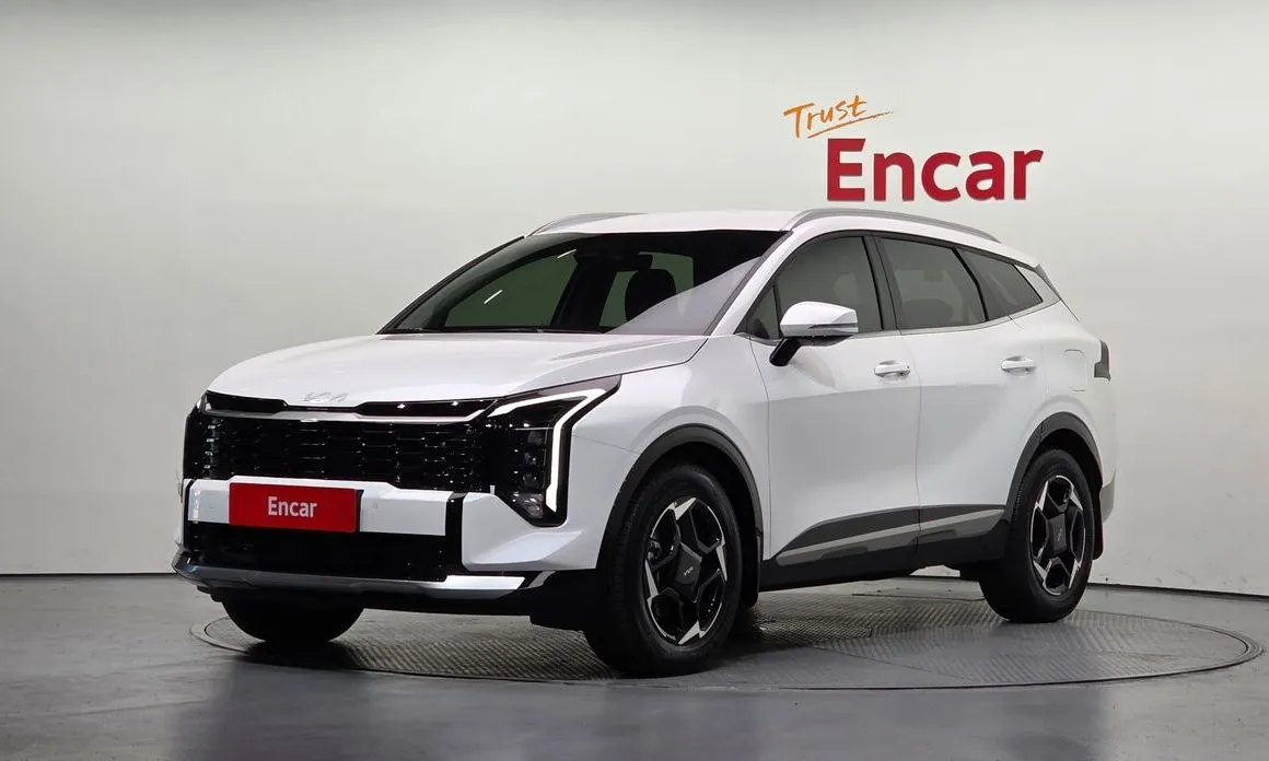 Kia Sportage — фото 1