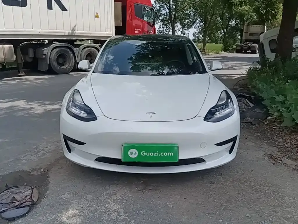 Tesla Model 3 — фото 9