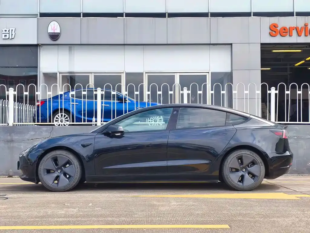 Tesla Model 3 — фото 7
