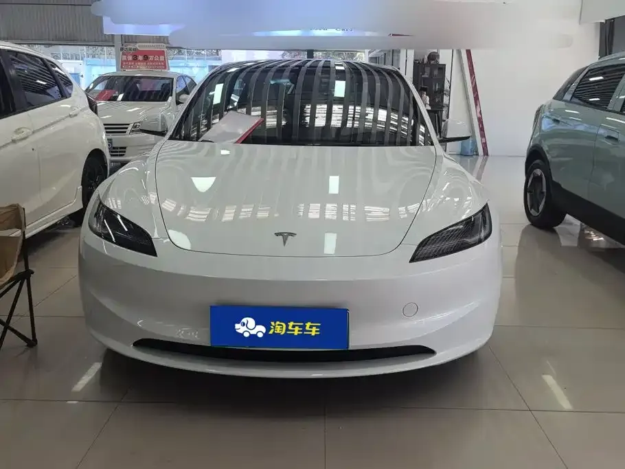 Tesla Model 3 — фото 9