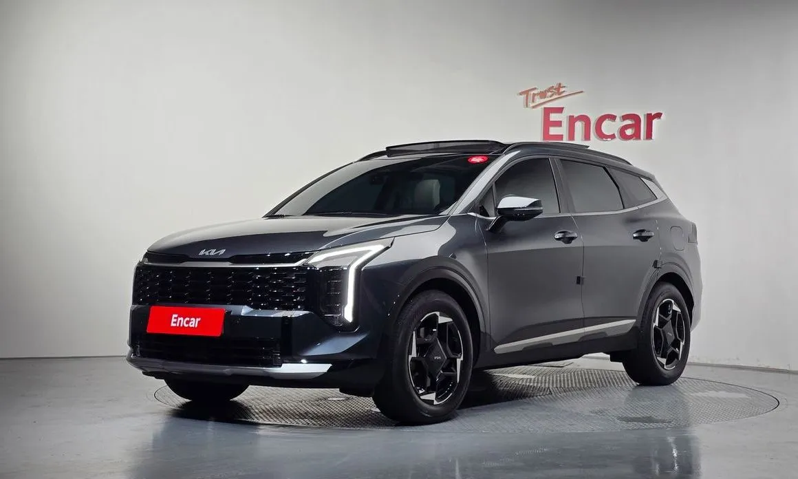 Kia Sportage — фото 1