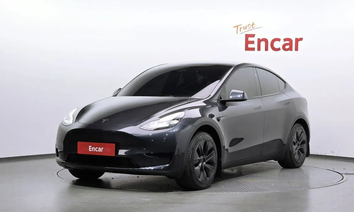 Tesla Model Y — фото 1