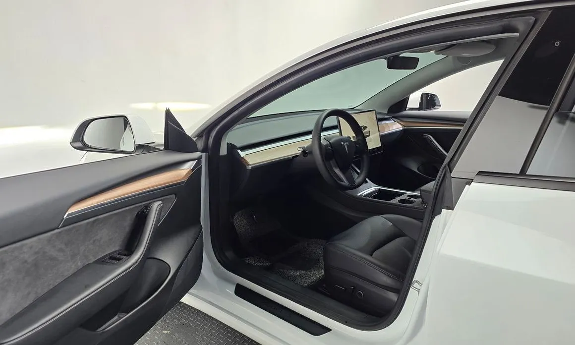Tesla Model 3 — фото 5