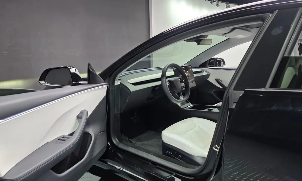 Tesla Model 3 — фото 6