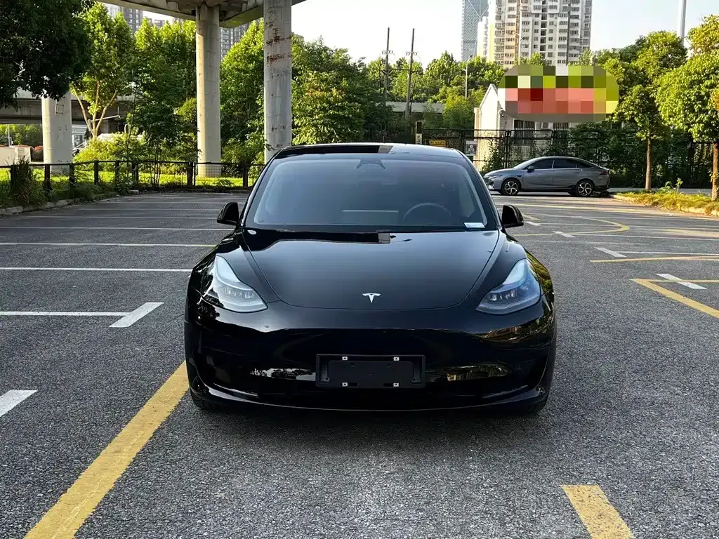 Tesla Model 3 — фото 10