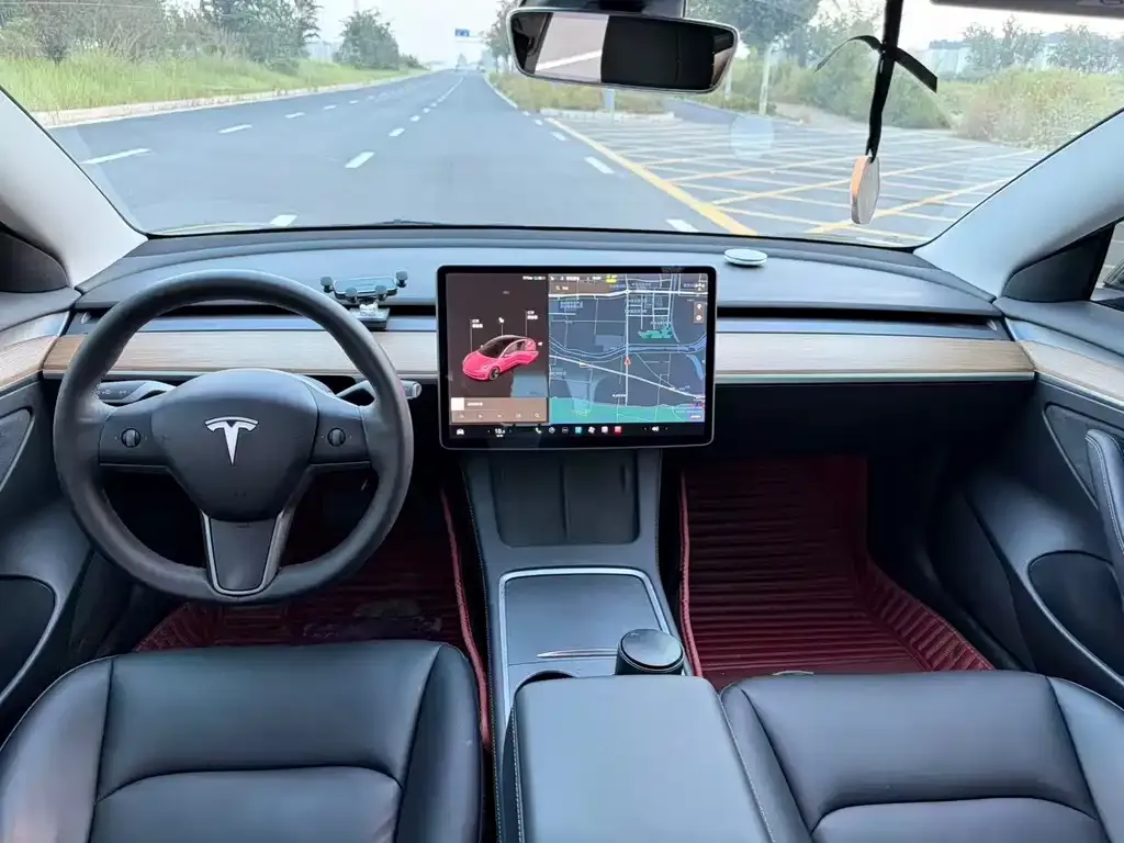 Tesla Model 3 — фото 9