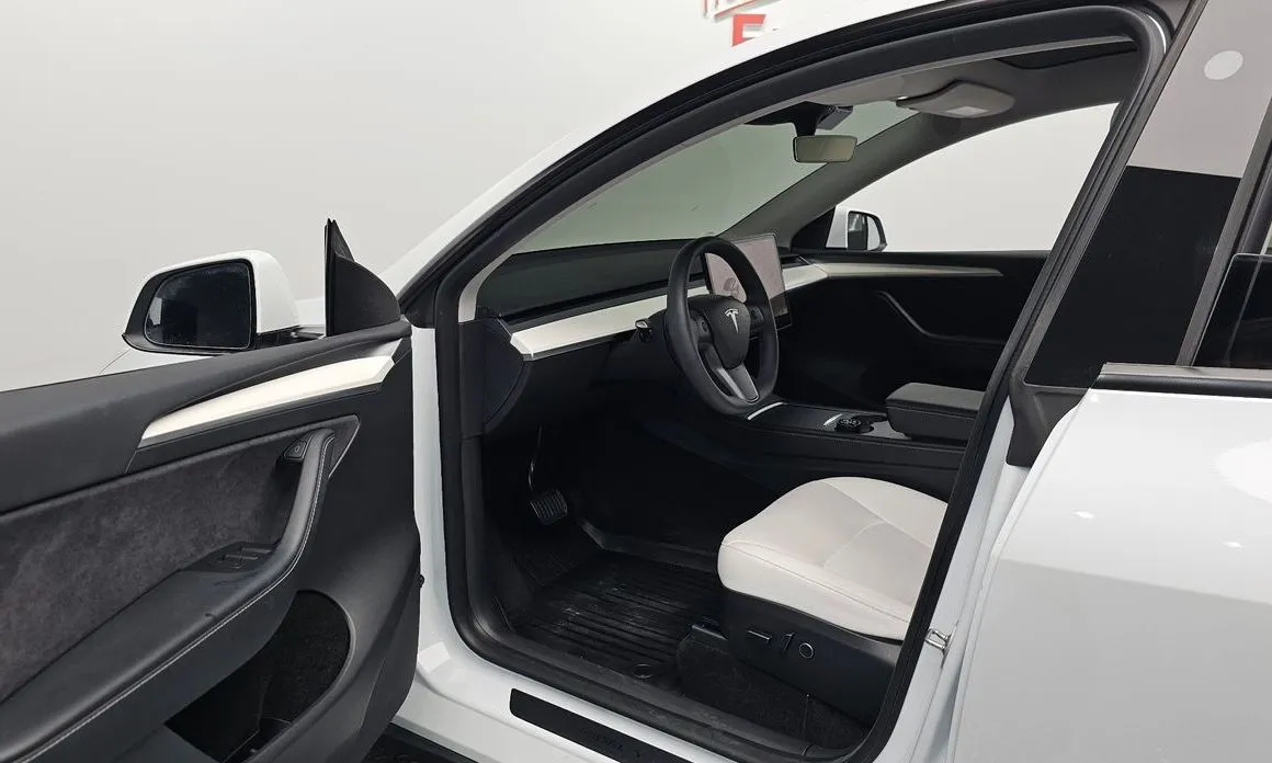 Tesla Model Y — фото 7