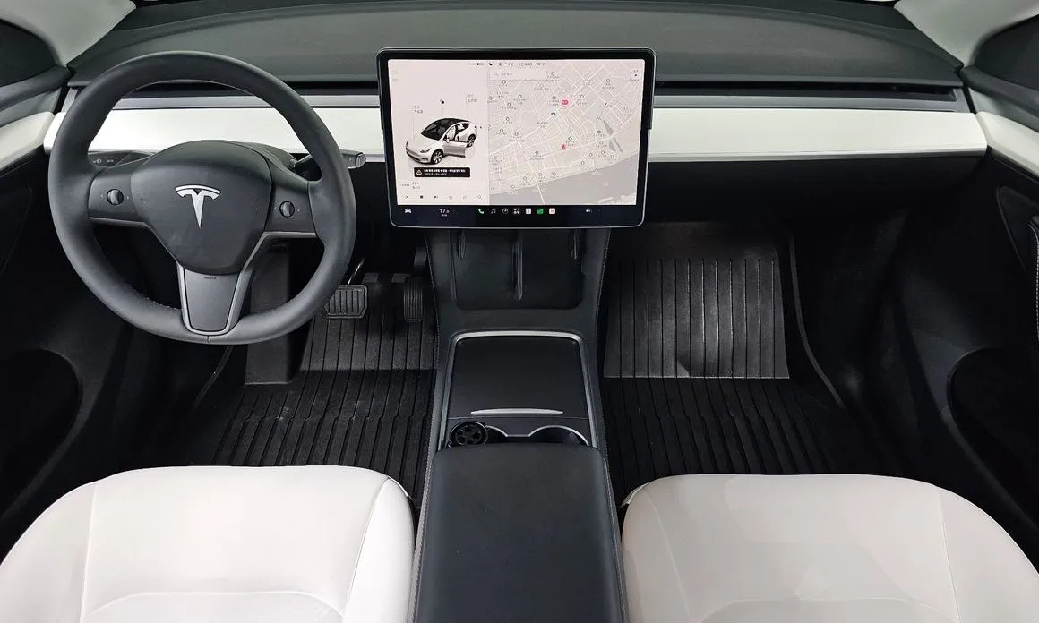 Tesla Model Y — фото 8