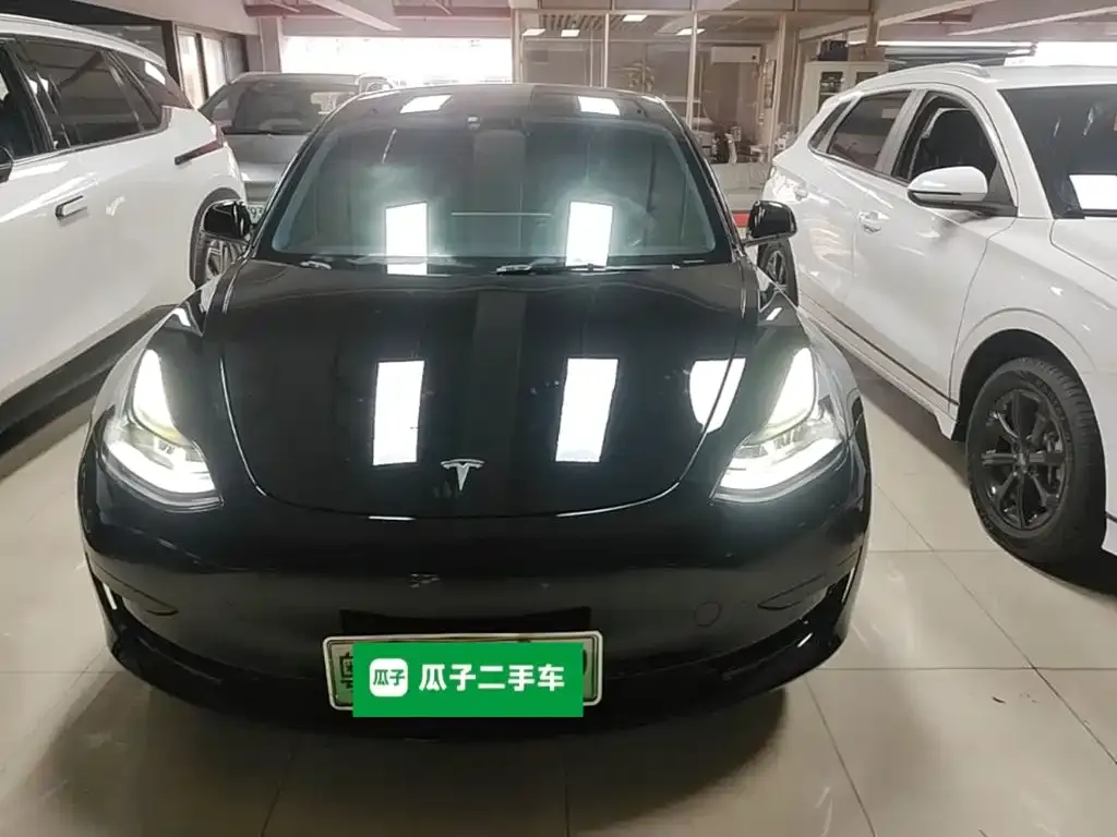 Tesla Model 3 — фото 3