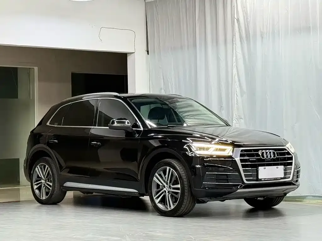 Audi Q5L — фото 6